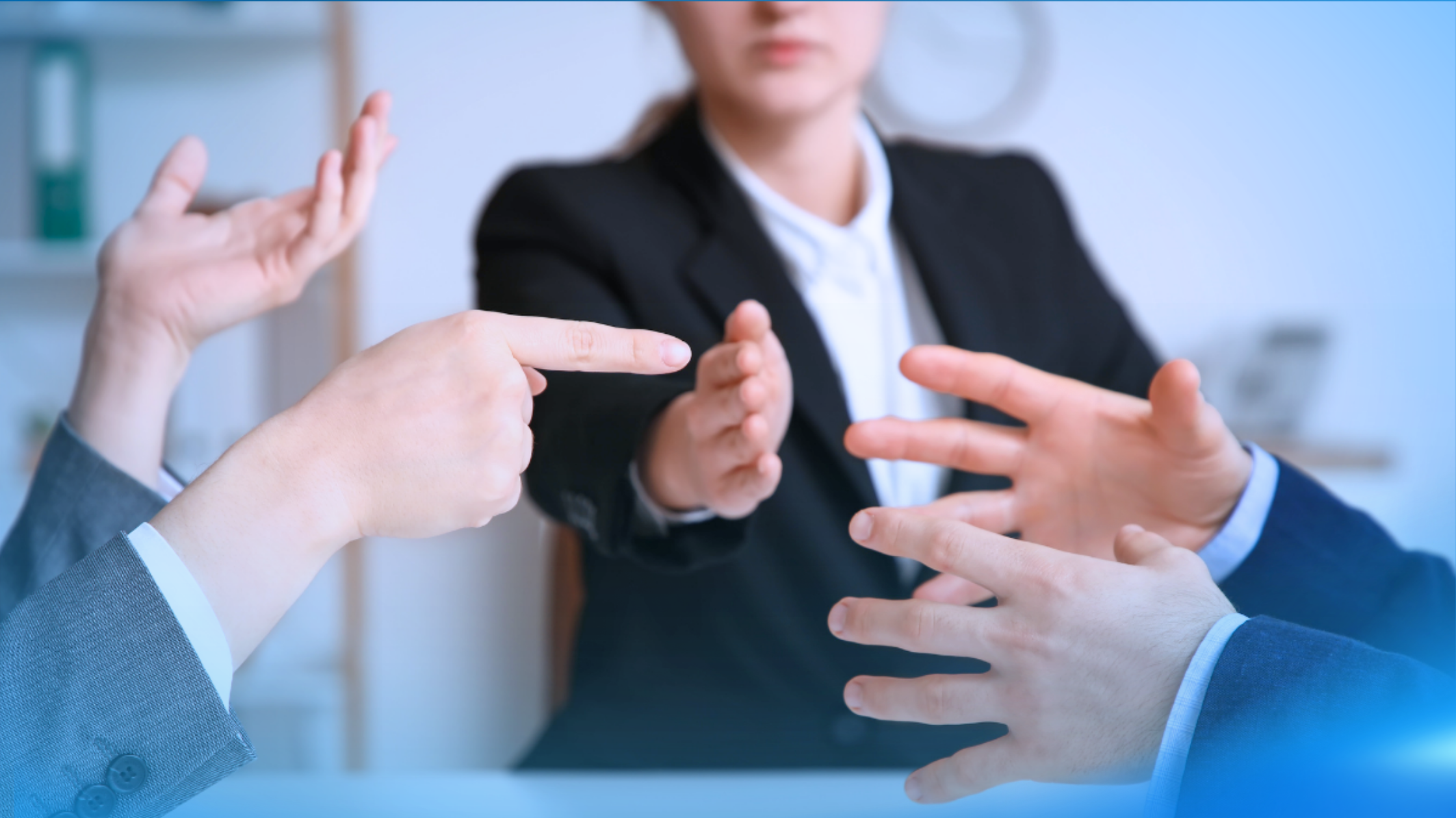 Leader helping navigate workplace conflict between two employees during a dispute.